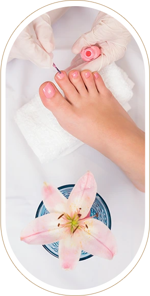 woman getting her toenails painted